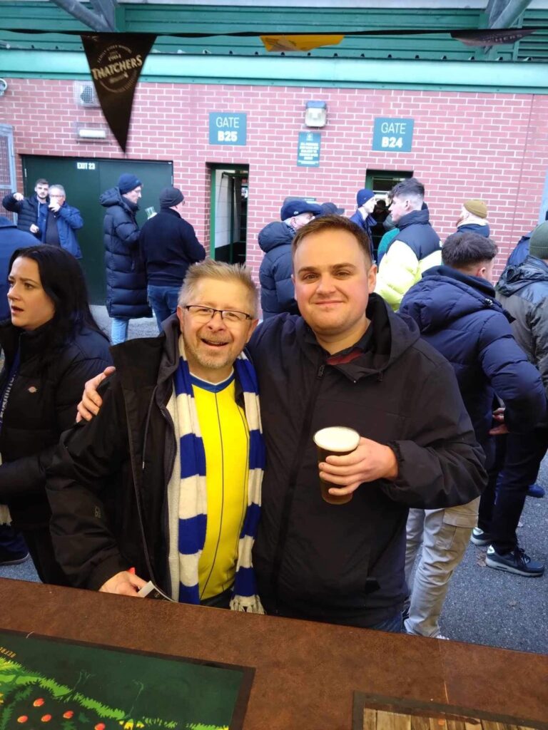 Kev and Nat enjoying a pint before the game